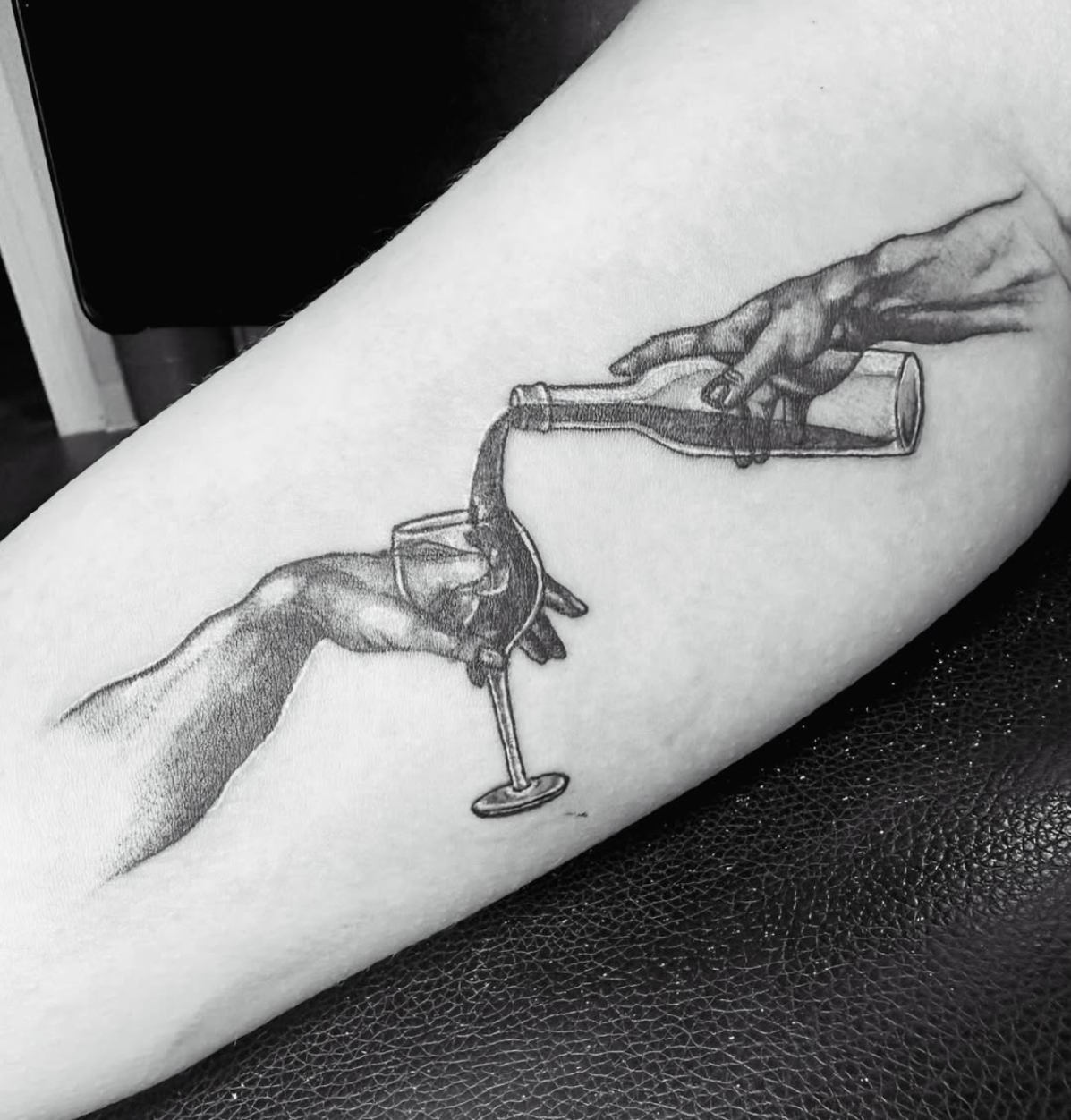 Creation of Adam hands pouring wine into a glass