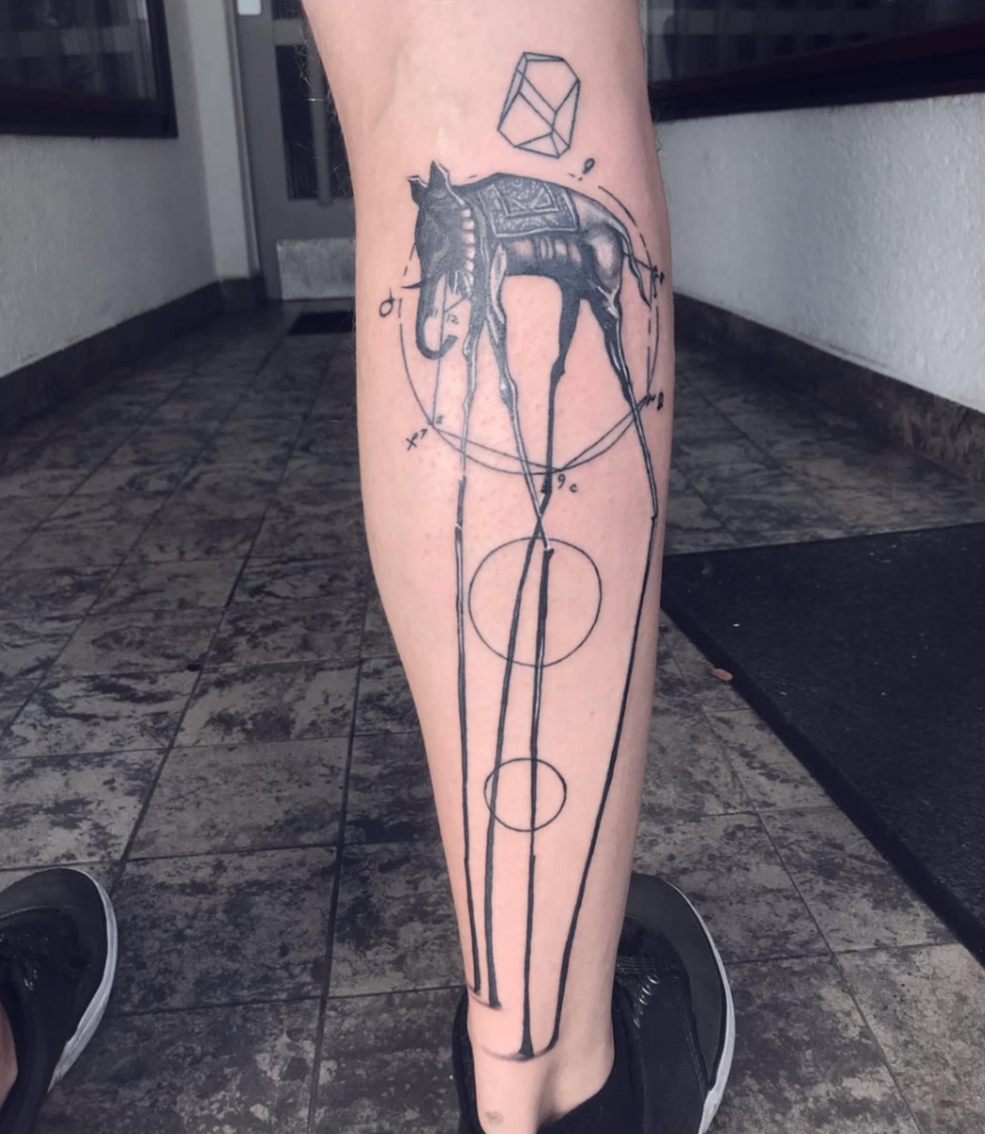 Geometric elephant with linework on calf
